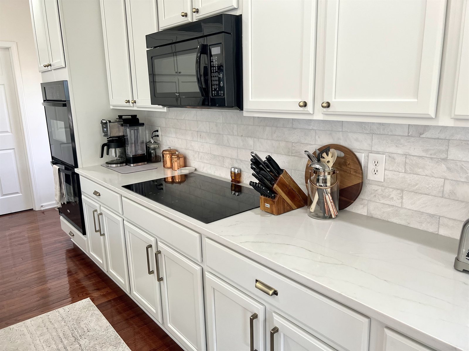 White kitchen — galley wall with subway tile