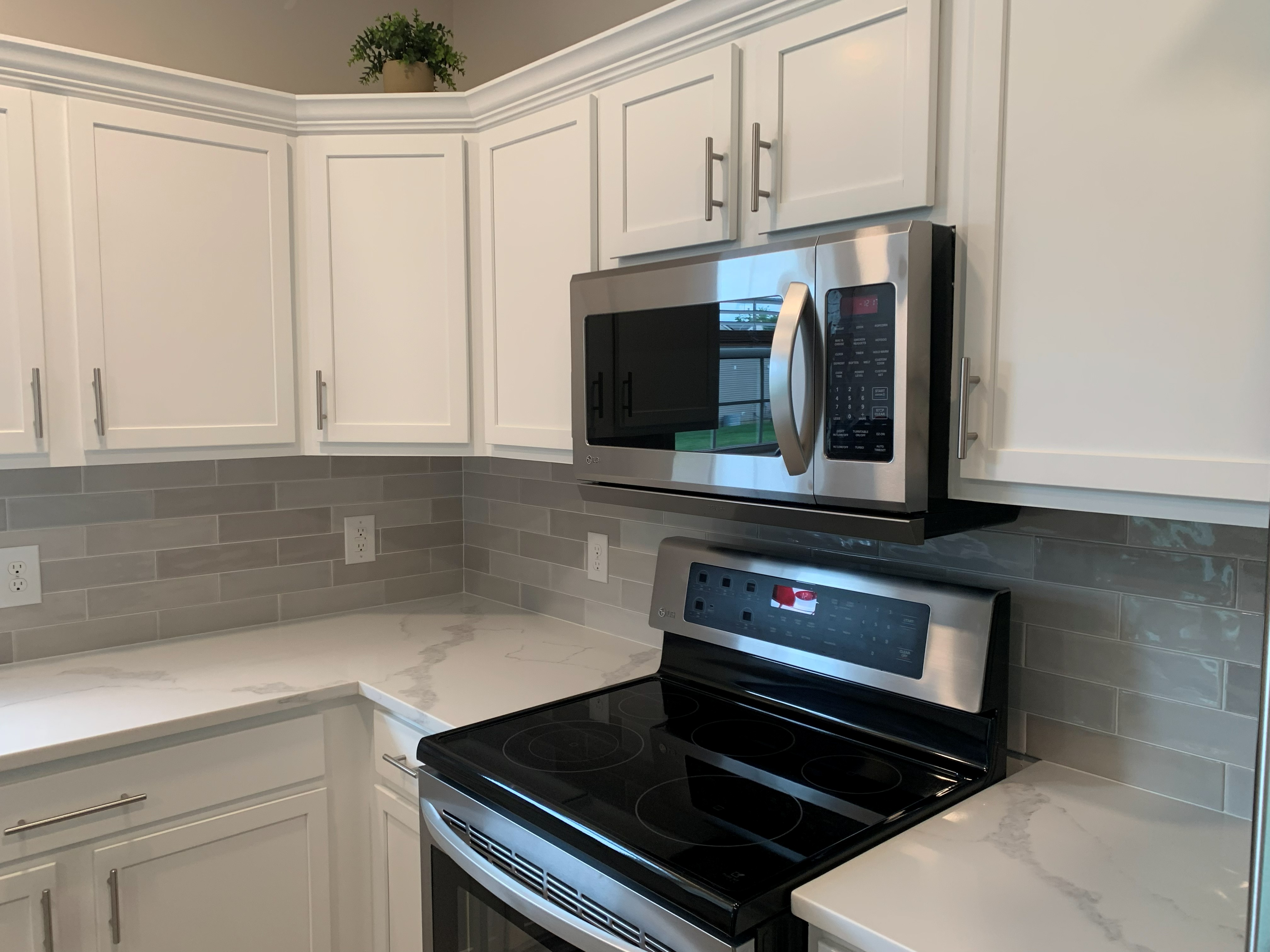 Second project — close-up of refinished cabinets and counter