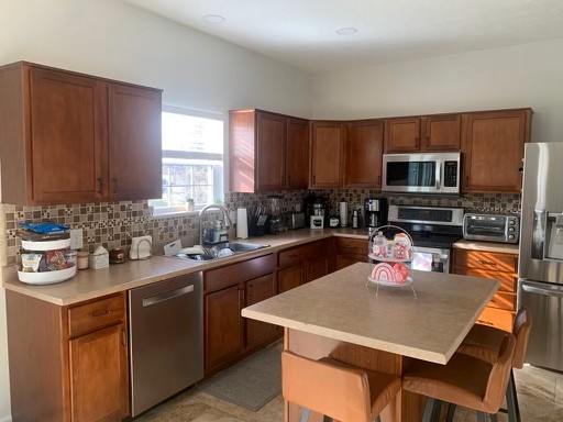 Second project — dated cabinets before refinishing